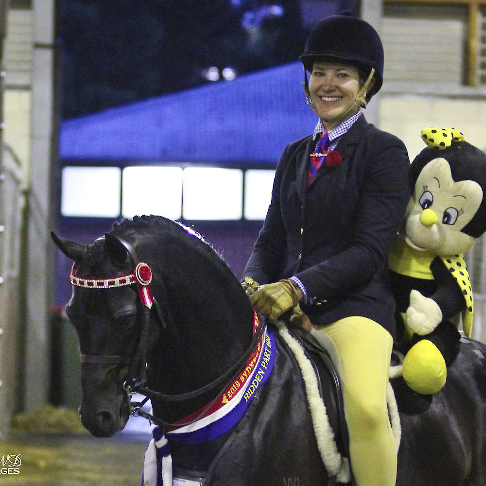 Neon and Kristy after a champion win at Sydney Royal with our bee mascot hitching a ride.