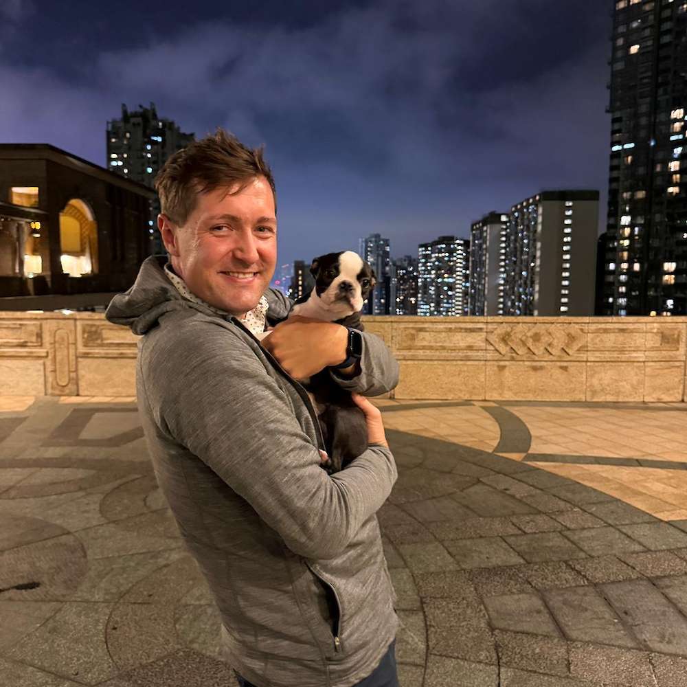 He has arrived! First cuddles for Warren & Ozzy in Hong Kong
