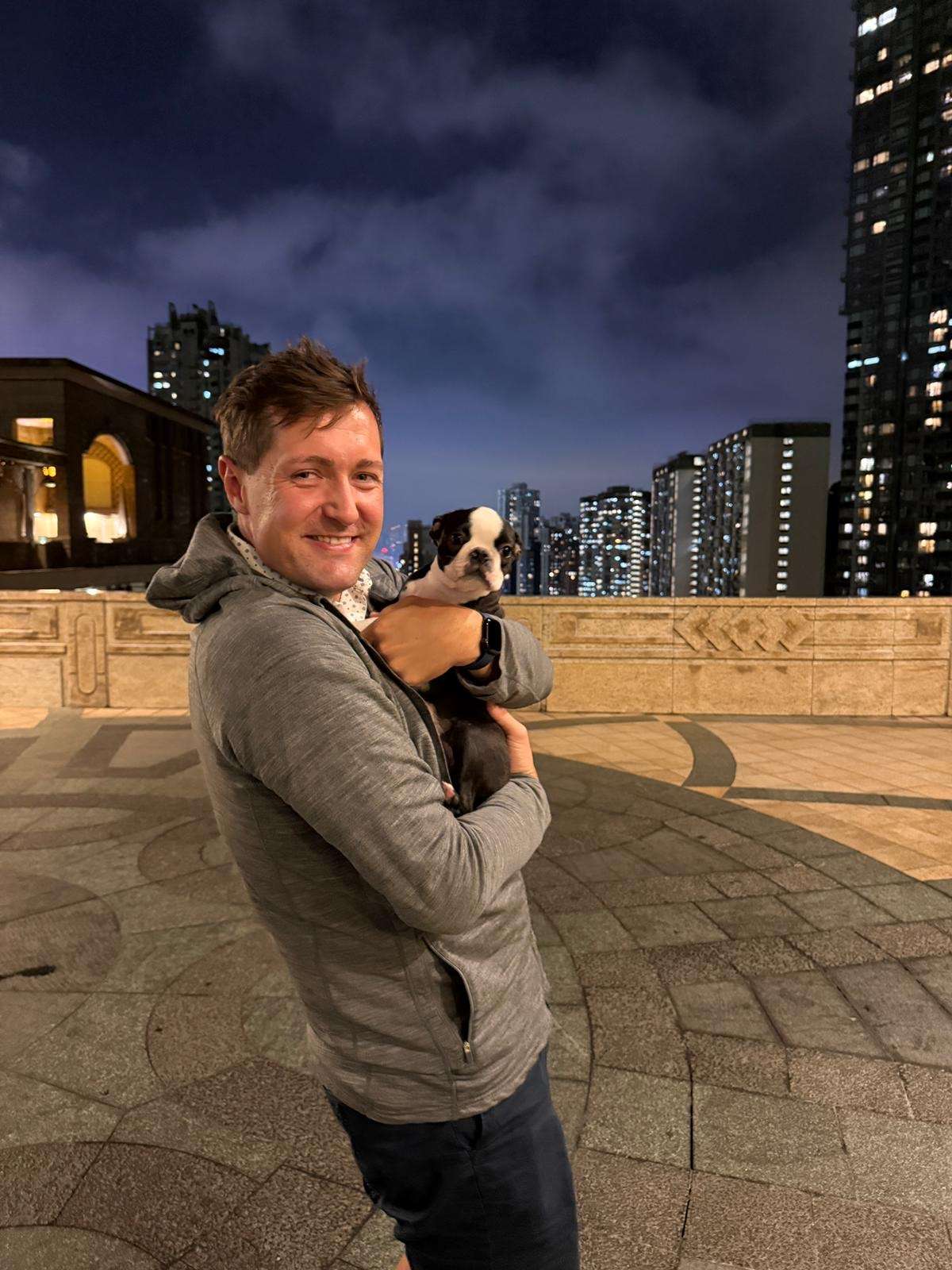He has arrived! First cuddles for Warren & Ozzy in Hong Kong